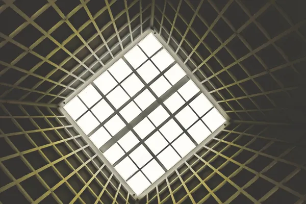 Abstract close-up of a white wall with subtle marks and variations, representing focused observation and perception